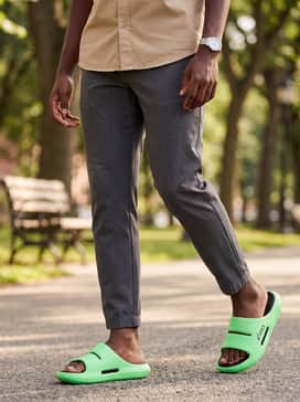 Actibreeze Hybrid Sandal 2 – Relaxed-fit black linen trousers and a breathable tan button-up shirt for a high-contrast, comfortable summer evening look.
