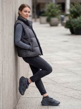 Adidas By Stella Mccartney Adistar – A streetwear-inspired outfit pairing dark wash skinny jeans with an oversized graphic tee and a matte grey puffer vest to highlight the shoe's chunky silhouette.
