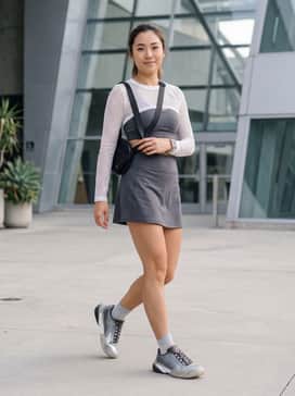Adidas By Stella Mccartney Barricade Tennis Shoes – Monochrome Athletic Set: A matching charcoal grey sports bra and high-waisted performance leggings, layered with a sheer white mesh long-sleeve top for a sleek court-ready look.