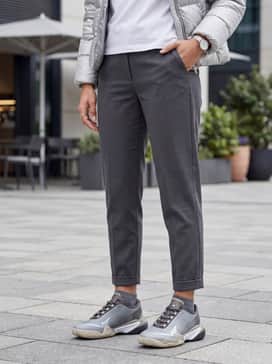 Adidas By Stella Mccartney Barricade Tennis Shoes – Elevated Streetwear: Tailored black joggers, a tucked-in white graphic tee, and an oversized silver puffer jacket to play off the shoe's metallic tones.