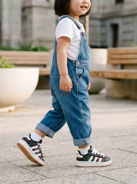 Adidas Liberty London Campus 00s Comfort Closure Elastic Lace Shoes – Classic blue denim overalls worn over a crisp white cotton t-shirt for a timeless, playground-ready look.