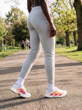 For a casual day, pair with slim-fit tapered joggers in a light grey marl and a fitted white technical tee to keep the focus on the vibrant footwear.