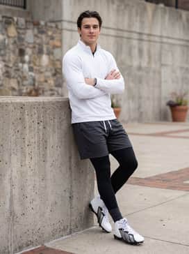 Tapered technical track pants and a lightweight quarter-zip training top for pre-game warm-ups and agility drills.