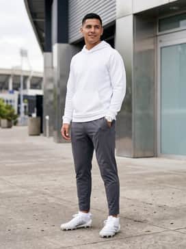 Adizero Electric Ii Football Cleats – Tapered charcoal grey moisture-wicking joggers paired with a white performance hoodie for warm-ups and sideline drills.