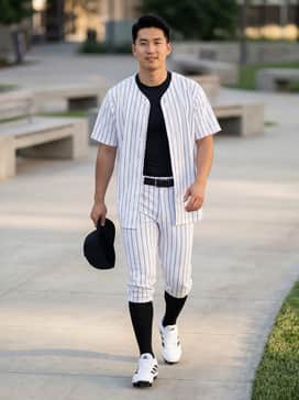 Adizero Impact 20 Molded Baseball Cleats – A full professional baseball uniform featuring white pinstripe jerseys and matching white pants with a black leather belt.