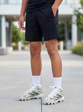 Adizero Impact2 Ii Kids Molded Rubber American Football Cleats – The Practice Specialist: Combine with black moisture-wicking athletic shorts, a neon yellow training tee, and white performance crew socks for a high-visibility training look.