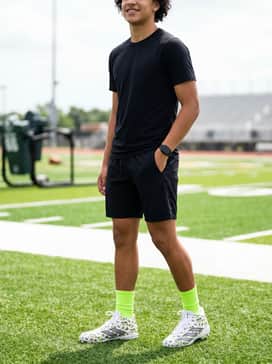 Adizero Impact2 Ii Kids Molded Rubber American Football Cleats – High-Visibility Practice Gear: Combine with neon green athletic socks and black training shorts to highlight the electric colors in the shoe's money-themed pattern.