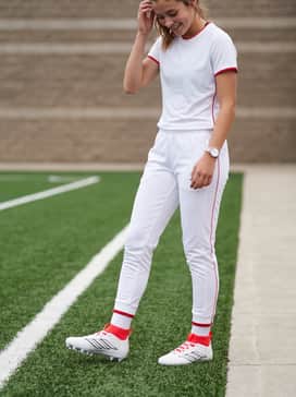 Adizero Impact2 Ii Kids Patrick Mahomes Cleats – A sleek, tapered sideline tracksuit in a matching white or red colorway for a unified team look during pre-game warmups.