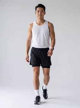 Performance-focused: Pair with black lightweight running shorts, a breathable white mesh tank top, and moisture-wicking ankle socks for long-distance training sessions.