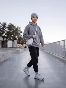 Monochromatic techwear: Pair these shoes with black tapered cargo joggers, a grey oversized tech-fabric hoodie, and a silver crossbody bag for a cohesive, futuristic urban look.