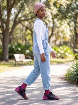 For a casual weekend outing, style these with denim overalls over a white long-sleeve tee and a colorful beanie to lean into a trendy, youthful streetwear vibe.