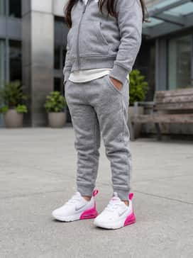 Grey heather joggers paired with a matching zip-up hoodie for a cozy, coordinated athleisure vibe perfect for family outings.