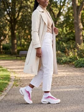 Wear with cropped straight-leg white trousers, a beige fitted turtleneck, and a classic cream trench coat for a sophisticated urban vibe.