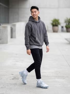 Air Vapormax Plus – Pair with slim black joggers, a charcoal oversized hoodie, and a matching grey beanie for a complete streetwear look.