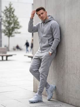 Combine with grey tech-fleece joggers and a sleek windbreaker to embrace a futuristic athleisure aesthetic.