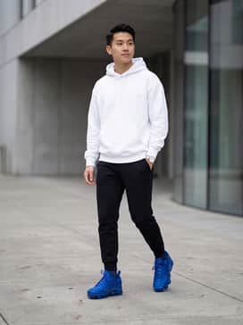Air Vapormax Plus – Pair with black tapered joggers and an oversized white hoodie for a clean, high-contrast look that highlights the shoe's vibrant color.