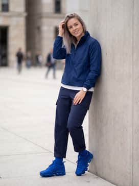 Combine with navy cargo pants and a technical windbreaker for a functional, tech-inspired streetwear outfit.