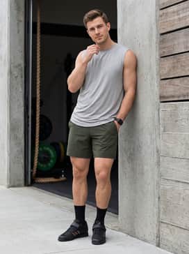 Apwr Perfect 3 Shoes – Technical 7-inch inseam athletic shorts in a deep olive or burgundy to complement the copper stripes, paired with a breathable light grey sleeveless performance tee.