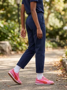 Arizona Energy – A white pleated tennis skirt, a navy blue polo shirt, and white crew socks for a retro-preppy vibe.