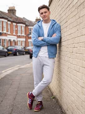 Aston Villa Spzl Fc Shoes – Light grey marl joggers and a sky blue zip-up hoodie that picks up on the three-stripes color for a cohesive and comfortable athleisure ensemble.