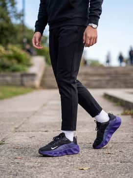 Ava Rover – Black high-waisted athletic leggings paired with an oversized lavender hoodie for a cohesive, sporty-chic look.