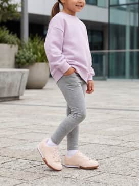 Bella Donna Pearls Little Kids Easy On Sneakers – Soft grey cotton leggings paired with an oversized pastel lilac sweatshirt for a comfortable yet coordinated athletic look.