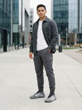 Climacool Laced Shoes – A minimalist casual outfit with slim-fit dark indigo denim, a crisp white heavyweight t-shirt, and a charcoal grey overshirt for layered depth.
