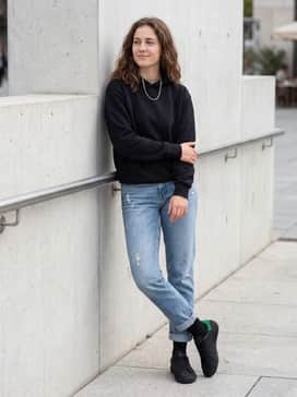 Clot Stan Smith Shoes By Edison Chen – Distressed light-wash straight-leg jeans with a crisp black hoodie and a silver chain necklace for a classic urban streetwear aesthetic.