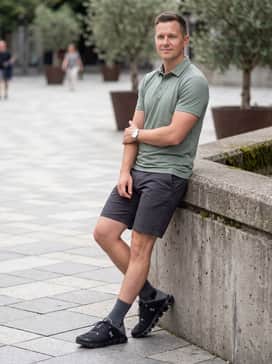 Match with charcoal chino shorts and a breathable sage green polo for a comfortable yet put-together warm-weather outfit.