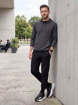 A high-tech recovery outfit consisting of tapered performance joggers with ankle zips and a seamless moisture-wicking hoodie.