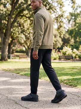 Combine with black performance joggers and an olive green quarter-zip pullover for a sophisticated athleisure vibe.