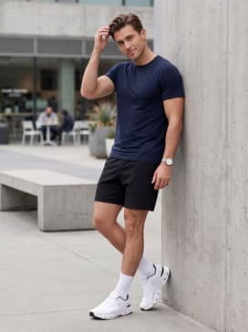 Cloudpulse 2 – Breathable black athletic shorts, a fitted navy performance t-shirt, and white crew socks for a classic, high-intensity training outfit.