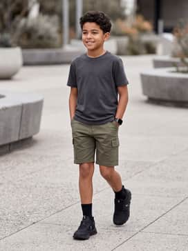 Cargo shorts in olive or khaki matched with a simple cotton hoodie for a comfortable, durable outfit perfect for weekend exploring.