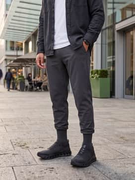 A refined weekend look with slim-fit dark indigo denim, a heavyweight white cotton t-shirt, and an unbuttoned charcoal flannel shirt.