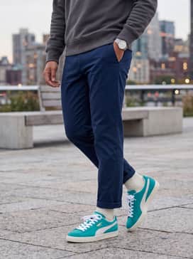 Clyde Og – Combine with navy blue chinos and a grey crewneck sweatshirt to create a balanced, smart-casual outfit where the teal pops.