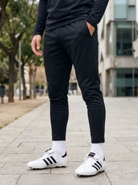 Copa Mundial Soccer Cleats – A slim-fit quarter-zip training top paired with tapered athletic track pants for pre-game warm-ups.