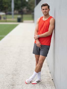 Copa Pure Iv Pro Turf Soccer Shoes – A lightweight, breathable mesh tank top in solar red to coordinate with the outsole, paired with 5-inch inseam athletic shorts for maximum mobility during drills.