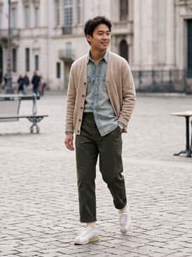High-waisted light wash mom jeans paired with a tucked-in crisp white organic cotton tee and a vintage oversized denim jacket.