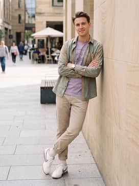 Wear with beige chinos cuffed at the ankle, a tucked-in lavender graphic tee, and an open flannel shirt to complement the shoe's accent colors.