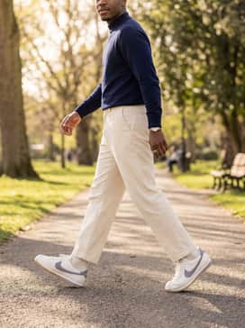 Cortez Leather – Match with straight-leg corduroy trousers in a cream shade and a navy blue mock-neck sweater for a sophisticated, textural casual outfit.