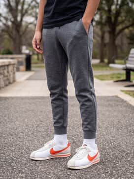 Cortez Textile – Grey tech-fleece joggers paired with a matching charcoal hoodie and bright white crew socks for a modern, athletic-inspired look perfect for gym class or play.