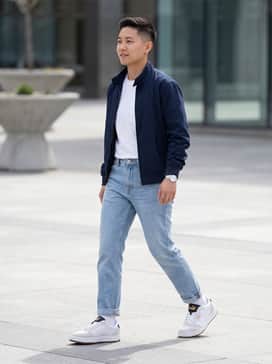 Court Classic Lux Suede – Light wash straight-leg jeans with a white pocket tee and a navy blue Harrington jacket for a timeless, effortless weekend outfit.