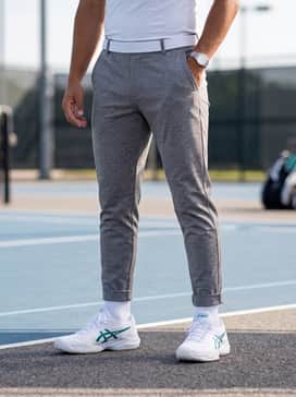 Court Ff 3 Novak – Slim-fit heather grey joggers and a fitted white compression tee topped with a lightweight teal windbreaker to highlight the sneaker's branding.