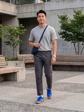Pair with slim-fit dark wash denim jeans, a clean white crewneck t-shirt, and a navy blue bomber jacket for a timeless, coordinated look.
