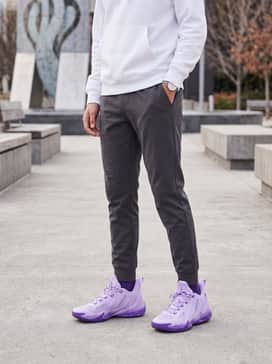 Curry 13 – Pair with tapered charcoal joggers and a clean white hoodie to let the vibrant purple shoes serve as the outfit's statement piece.