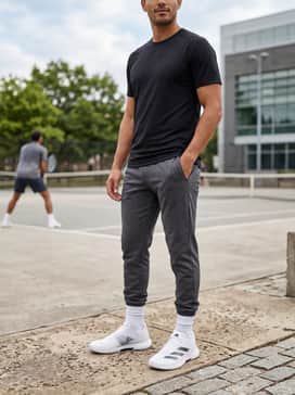Pair with charcoal grey tapered joggers and a fitted black moisture-wicking t-shirt for a sleek gym-to-street transition.