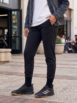 Dropset 3 Training Shoes – Tapered black joggers and a tucked-in oversized white tee with a denim jacket for a balanced, casual urban ensemble.