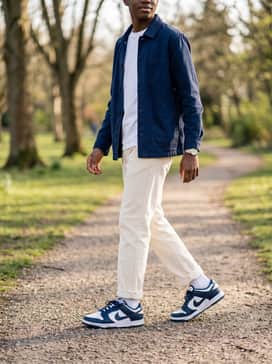 Wear with cream-colored corduroy trousers and a navy blue worker jacket over a simple white pocket tee to create a sophisticated, textured minimalist outfit.