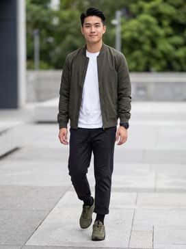 Pair with black tapered joggers, a matching olive green bomber jacket, and a crisp white t-shirt for a cohesive and modern athleisure look.