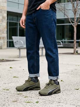 Combine with slim-fit dark indigo denim jeans, a heather gray crewneck sweatshirt, and a charcoal beanie for a classic streetwear vibe.